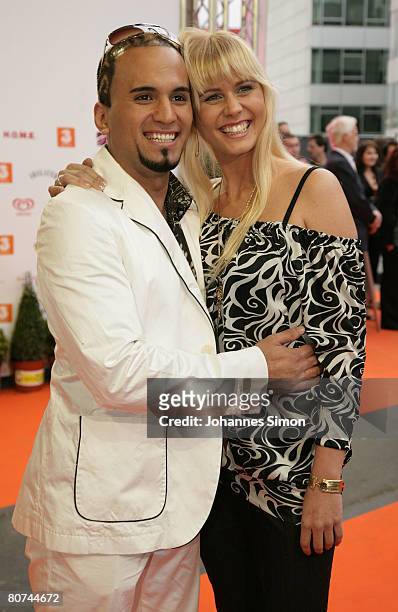 Austrian singer Eric Papilaya and his girlfriend attend the Amadeus Austrian Music Award 2008 on April 18, 2008 in Vienna, Austria.