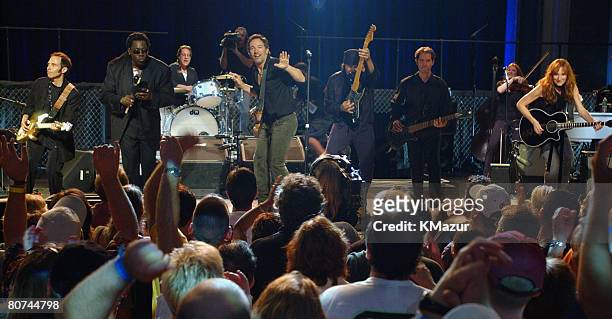 Nils Lofgren, Clarence Clemons, Max Weinberg, Bruce Springsteen, Steven Van Zandt, Garry W. Tallent and Patti Scialfa of the E Street Band
