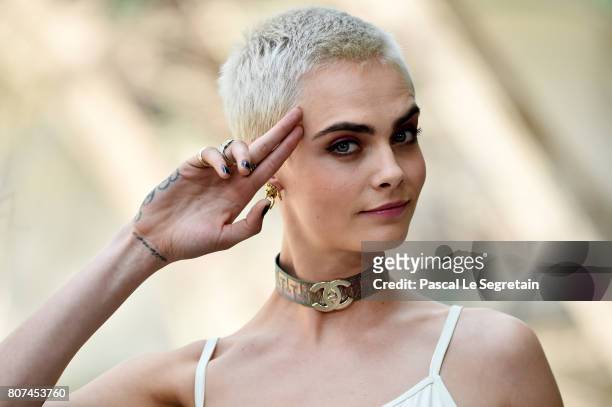 Cara Delevingne attends the Chanel Haute Couture Fall/Winter 2017-2018 show as part of Haute Couture Paris Fashion Week on July 4, 2017 in Paris,...