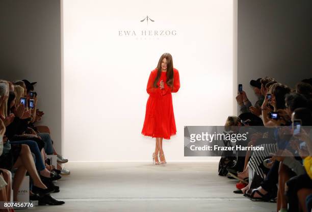 Designer Ewa Herzog acknowledges the applause of the audience at the Ewa Herzog show during the Mercedes-Benz Fashion Week Berlin Spring/Summer 2018...