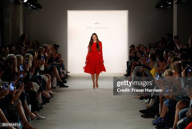 Designer Ewa Herzog acknowledges the applause of the audience at the Ewa Herzog show during the Mercedes-Benz Fashion Week Berlin Spring/Summer 2018...