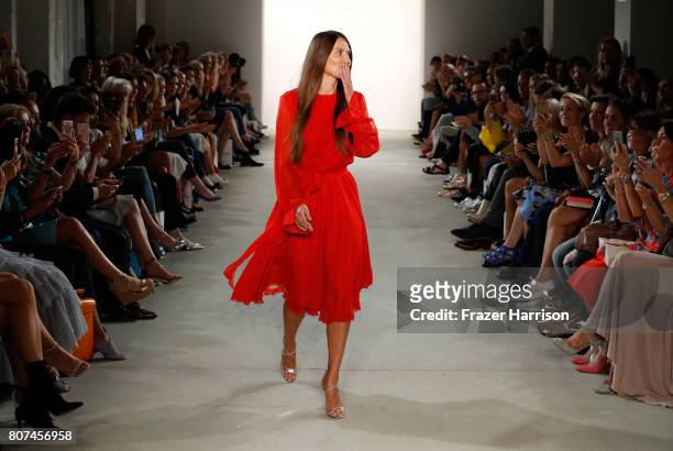 Designer Ewa Herzog acknowledges the applause of the audience at the Ewa Herzog show during the Mercedes-Benz Fashion Week Berlin Spring/Summer 2018...