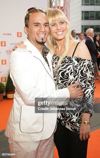 Austrian singer Eric Papilaya and his girlfriend attend the Amadeus Austrian Music Award 2008 on April 18, 2008 in Vienna, Austria.