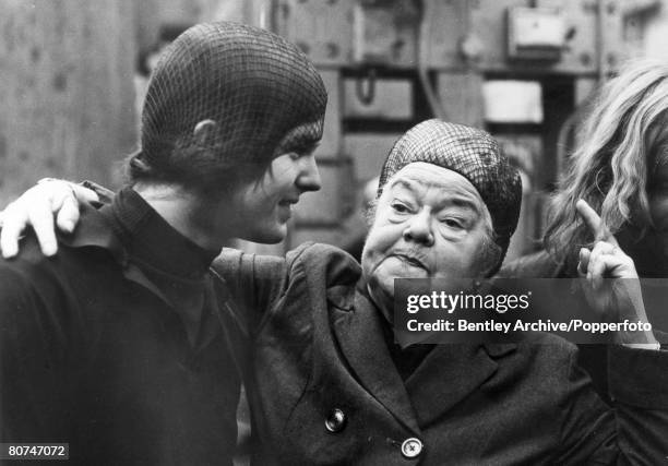 Stage and Screen, Personalities, pic: August 1970, "Coronation Street" star Violet Carson, dressed as her character "Ena Sharples" pictured with a...