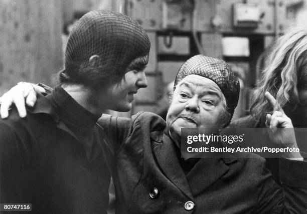 Stage and Screen, Personalities, pic: August 1970, "Coronation Street" star Violet Carson, dressed as her character "Ena Sharples" pictured with a...