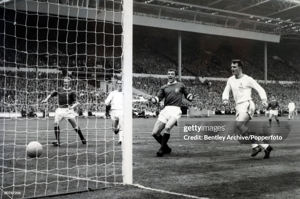 Sport Football. pic: 25th May 1963. FA. Cup Final at Wembley. Manchester United 3 v Leicester City 1. Manchester United's David Herd, 3rd right, scores United's 2nd goal, as Leicester City's Ian King, right can only watch.