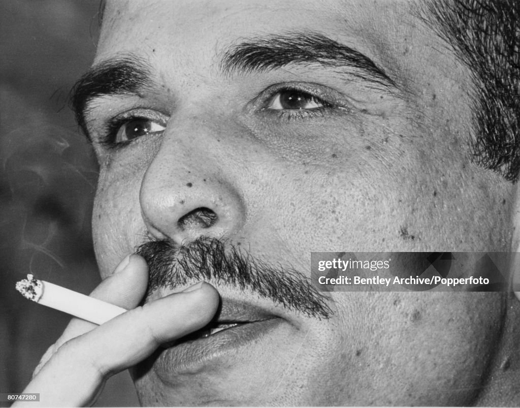 Royalty London, England. May 1968. Portrait of King Hussein of Jordan smoking a cigarette. The King is in London for talks with British Government officials.