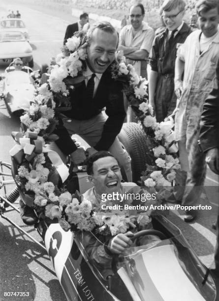 Sport, Motor Racing, September 1963, Brands Hatch, England, Driver Jim Clark laughing with Colin Chapman, designer at Lotus, Clark won the World...