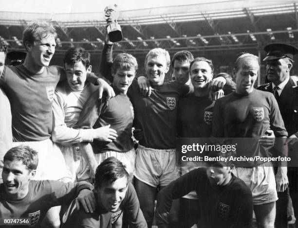 30th July 1966, 1966 World Cup Final at Wembley, England 4 v West Germany 2 aet, The England team with the trophy, Back row, left-right, Jack...