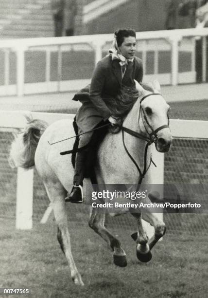 Royalty, Horse Racing, Royal Ascot, 16th June 1961, HRH Queen Elizabeth II cantering up to the start of a 5 furlong outing with other members of the...