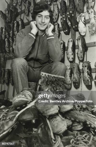Sport, Football, 23rd February 1971, Birmingham City's sixteen year old Trevor Francis cleaning his team-mates boots before playing in tonights FA...