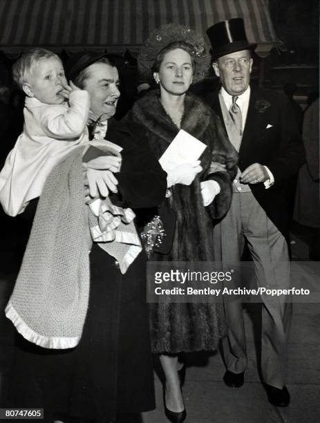 28th December 1961, London, Ronald Armstrong-Jones, pictured with his 3rd wife Jennifer and young son Peregrine, carried by the nurse