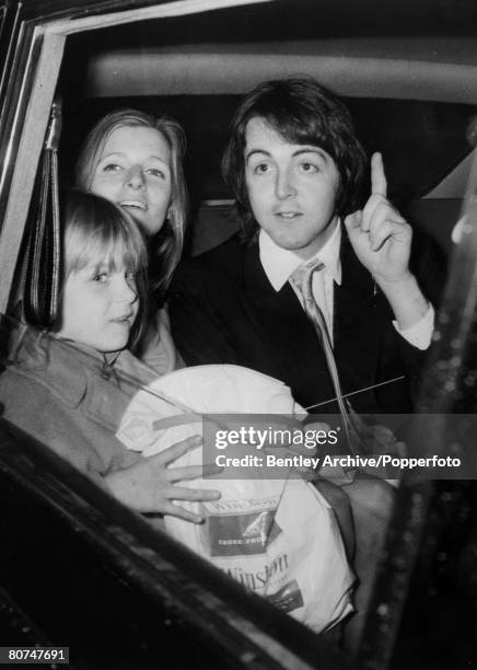 Music, Personalities, pic: 12th March 1969, Paul McCartney, the last of the Beatles drives away with his bride Linda Eastman and her daughter Heather...