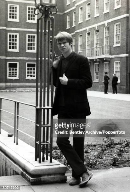 Music Personalities, pic: 25th June 1964, British pop singer Long John Bladry, born 1941, so called because he stood 6 feet 7 inches tall, who...