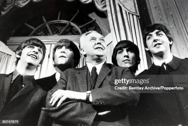 19th March 1964, A picture of British pop group the Beatles when they met the British Prime Minister Mr Harold Wilson when he presented them all with...