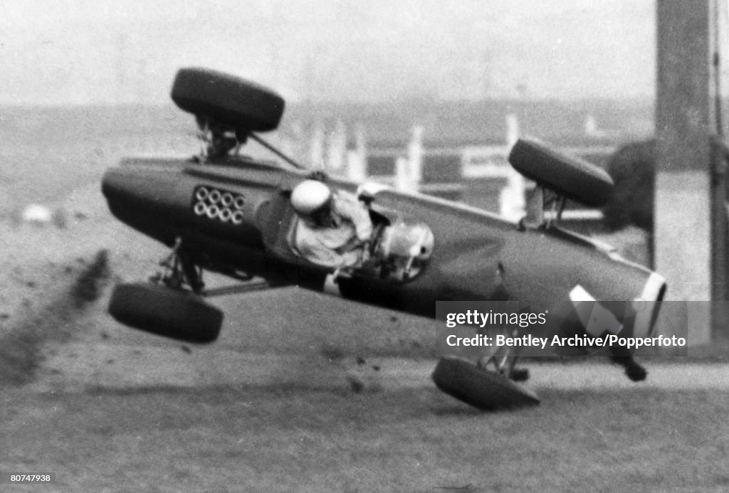 Sport Motor Racing. pic: 17th April 1964. Aintree, Liverpool. American racing driver Richie Ginther driving a BRM. crashes, as he car goes airborne at 120 mph. The car landed upside down but the driver escaped alive suffering cut jaw and fractured ribs.