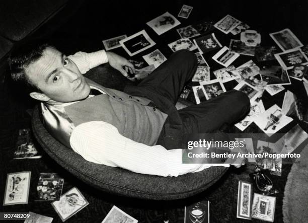 23rd December 1964, Tottenham Hotspur and England footballer star Jimmy Greaves surrounded by dozens of christmas cards sent by well-wishers