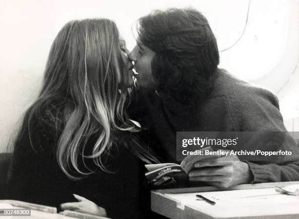 Cinema Personalities, pic: 6th October 1972, French actress Brigitte Bardot, , pictured with her boyfriend Leron Verges as they exchange a kiss on...