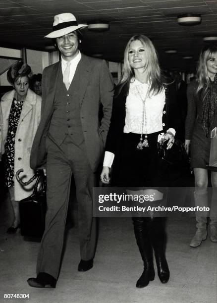 Cinema Personalities, pic: 23rd April 1968, French actress Brigitte Bardot, ,arrives in London escorted by her brother in law Patrick Bauchau,...