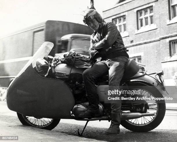 Circa 1964, A teenage "Rocker" with his Triumph motor-cycle, "Rockers" were motor cycle enthusiasts wearing leather and with no real regard for their...