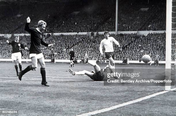 International Football, Wembley Stadium England 2 v Scotland 3, Scotland's Denis Law beats England goalkeeper Gordon Banks to score the first goal