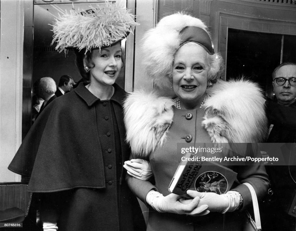 3rd February 1971 London, England. Authoress Barbara Cartland is shown with her daughter the Countess of Dartmouth at a launch party at the Dorchester Hotel for her book -We Danced All Night'.