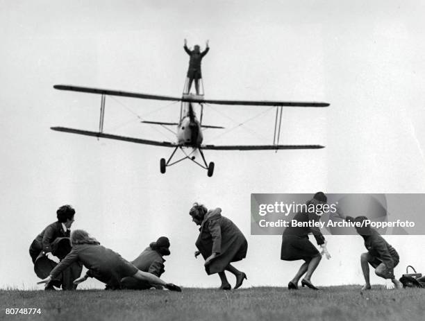 Volume 2, Page 130, Picture 5, Wycombe Air Park, England, 23rd May 28-year-old BEA air stewardess Elaine Mitchael wingwalking on top of a Tiger Moth...