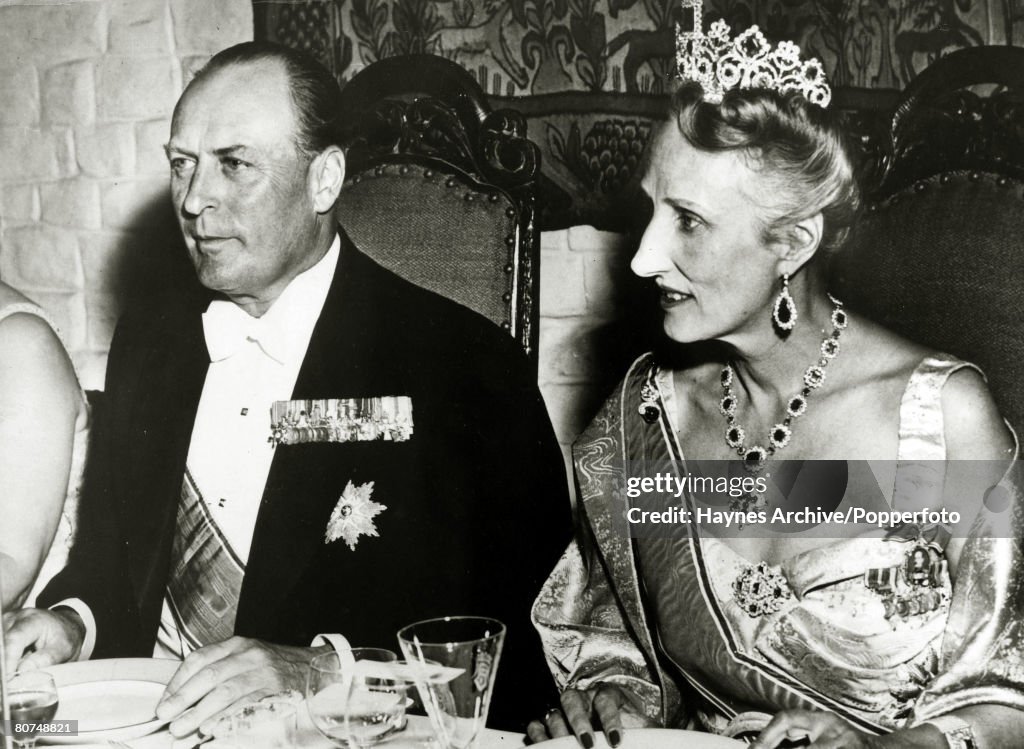Foreign Royalty Personalities. pic: July 1953. Crown Prince Olav (Olaf) of Norway, portrait, pictured with his wife Princess Martha at a gala dinner at Akerskos Castle to celebrate his 50th birthday. King Olav (1903-1991) succeeded his father King Haakon