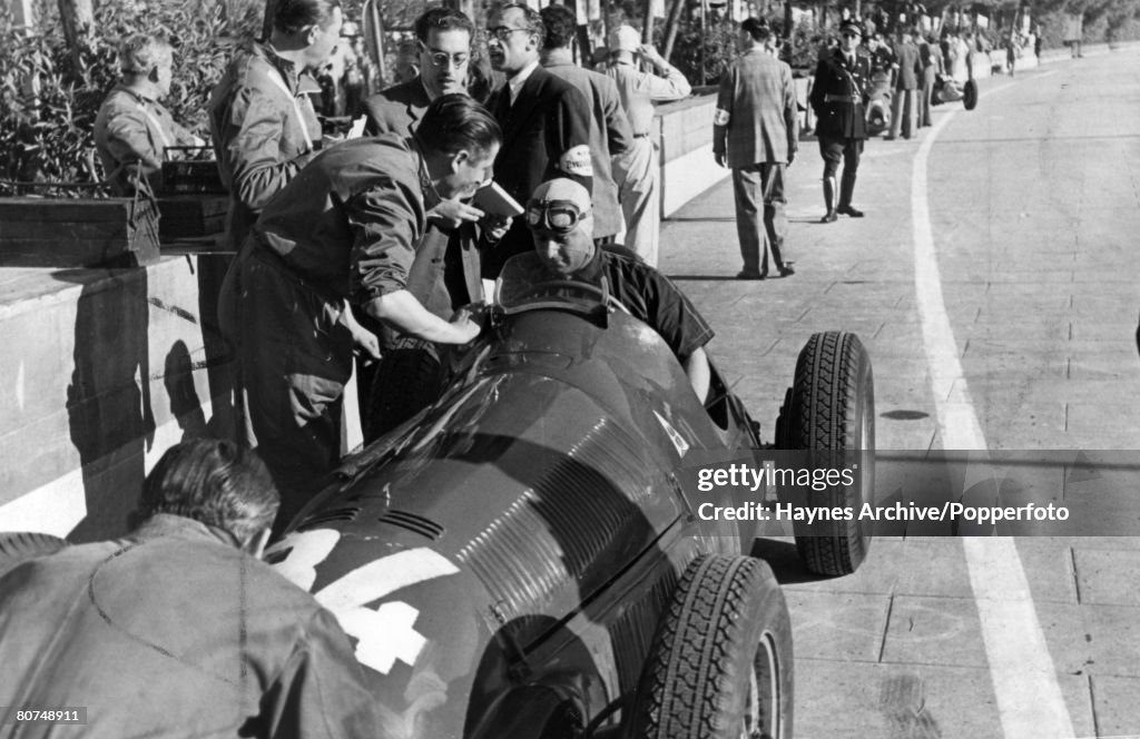 Sport Motor Racing. Formula One. pic: June 1950. Monaco Grand Prix at Monte Carlo. Argentinian driver Juan Manuel Fangio, pictured in his car during a stop in the race. Juan Fangio won the world championship five times in the 1950's.