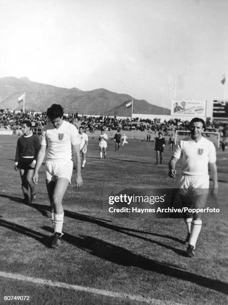 World Cup Finals Rancagua, Chile, 2nd June England 3 v Argentina 1, England's Maurice Norman and Jimmy Armfield leave the pitch after defeating...