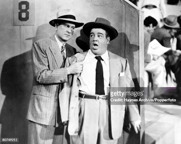 American comedy double-act Bud Abbott and Lou Costello are pictured in a still from the film -Mexican Hayride,'