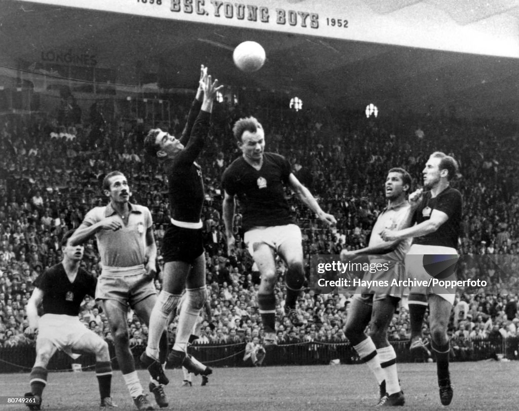 World Cup Quarter-Final, 1954 Berne, Switzerland. 27th June, 1954. Hungary 4 v Brazil 2. Brazilian goalkeer Castillo leaps high amongst a crowd of Hungarian players to catch the ball.