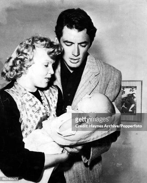 S, Famous American film actor Gregory Peck with his wife Greta and their baby son Jonathon
