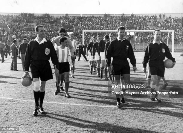 World Cup Finals Rancagua, Chile, 6th June Argentina 0 v Hungary 0, The Argentine and Hungarian teams walk onto the pitch accompanied by officials...