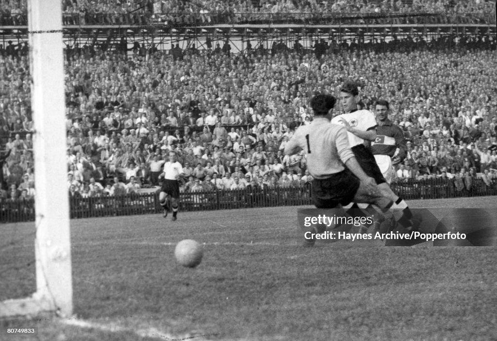 World Cup Finals, 1954 Berne, Switzerland. 17th June,1954. Germany 4 v Turkey 1. The Turkish goalkeeper Turgay is beaten by German forward Hans Shafer during their Group Two match.