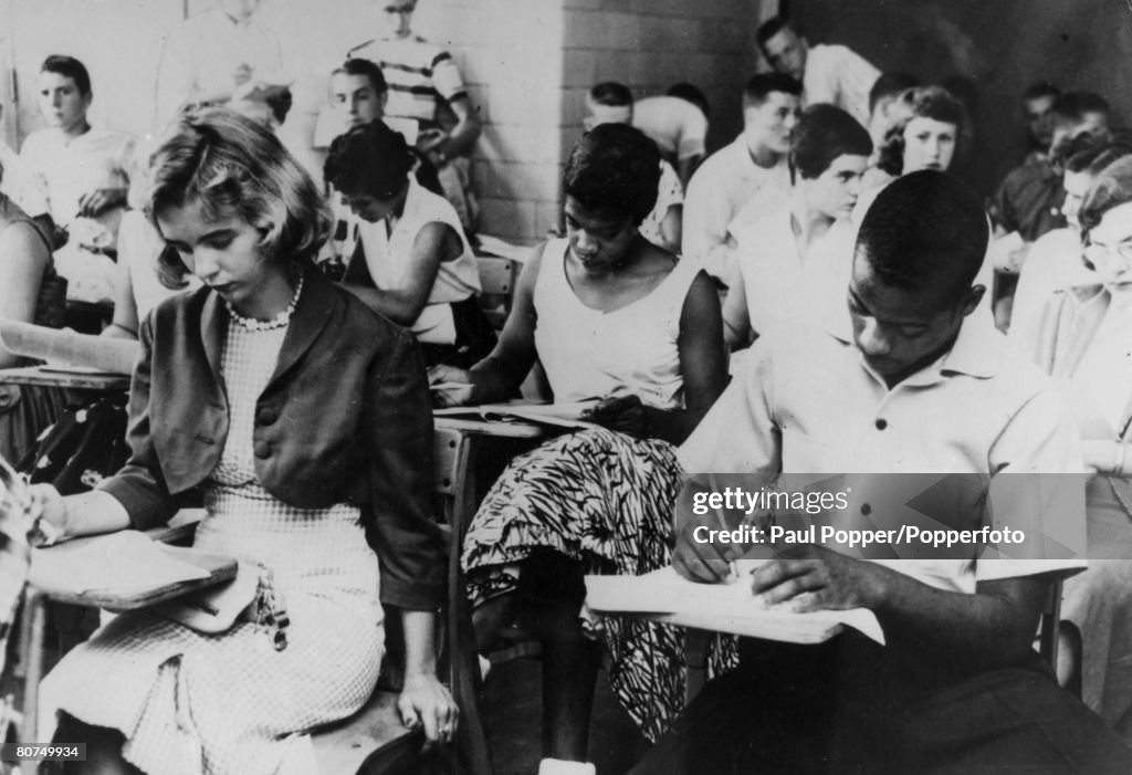 People Education. Race. USA. pic: September 1956. Middletown, Kentucky. The first day of the autumn term at Eastern High School, with black students working peacefully alongside white students.