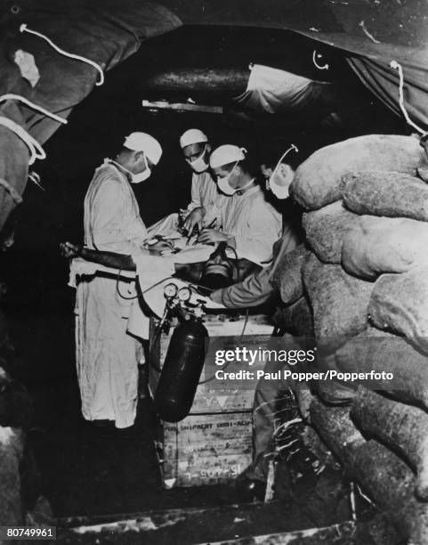 War and Conflict, World War Two, Far East, pic: circa 1943, An American field hospital used by the US, Army Medical Corps, perform an operation under...