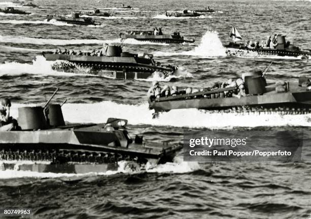 War and Conflict, World War Two, Far East, pic: 1944, American amphibious tracked vehicles in the water close to the Futatsune Beach on the well...