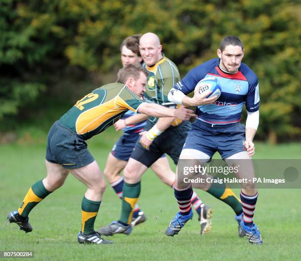Allan Glen's Alan Auld runs with ball during the Scottish Hydro National League 3 match at the Bearyards, Bishopbriggs.
