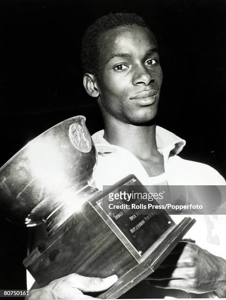Sport, Athletics, pic: 23rd January 1968, American long jumper Bob Beaman with his trophy awarded after setting a new indoor record in his event, Bob...