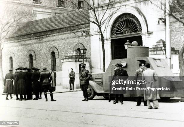 War and Conflict, Spanish Civil War, pic: 1930's, An armoured car and police guard outside the prison in Madrid when demonstrators were demanding the...