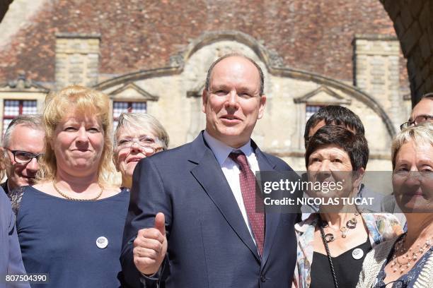 Prince's Albert II of Monaco poses in Duras, southwestern France, on July 4 before his visit at the city's castle which is a family house since 1777.