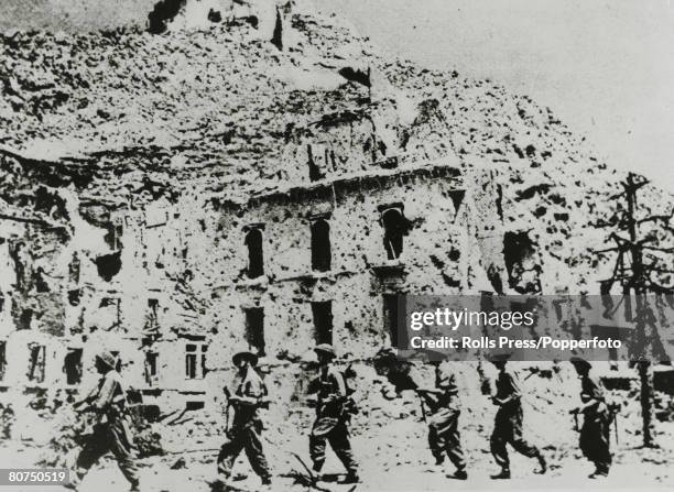 War and Conflict, World War II, Italy, pic: 1944, An Allied Polish patrol marches through the streets of Cassino in Italy, the scene of bloody...