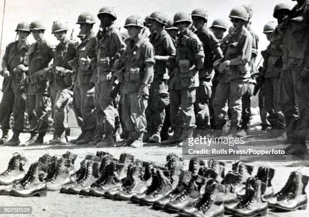 War and Conflict, The Vietnam War, pic: December 1967, Chu Lai, South Vietnam, The grim reality of war, as helmets, jungle boots and rifles are laid...