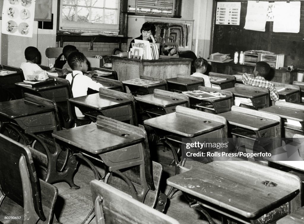 Education Segregation, USA. pic: 1964. Queens, New York. A near deserted classroom with just 5 black children attending, after a massive boycott by whites after the school had been included in the integration plan.