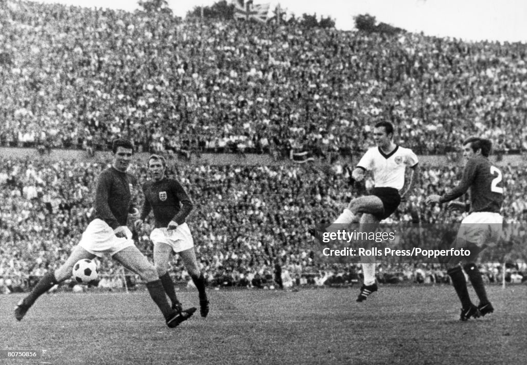 Sport Football. International Match in Hanover. West Germany 1 v England 0. West Germany's Franz Beckenbauer scores the winning goal as he shoots past England defenders left-right, Brian Labone, Bobby Moore and Keith Newton.