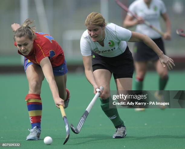 Birmingham's Hannah Richardson challenges with Canterbury's Jen Wilson during their play-off game at the University of Birmingham.