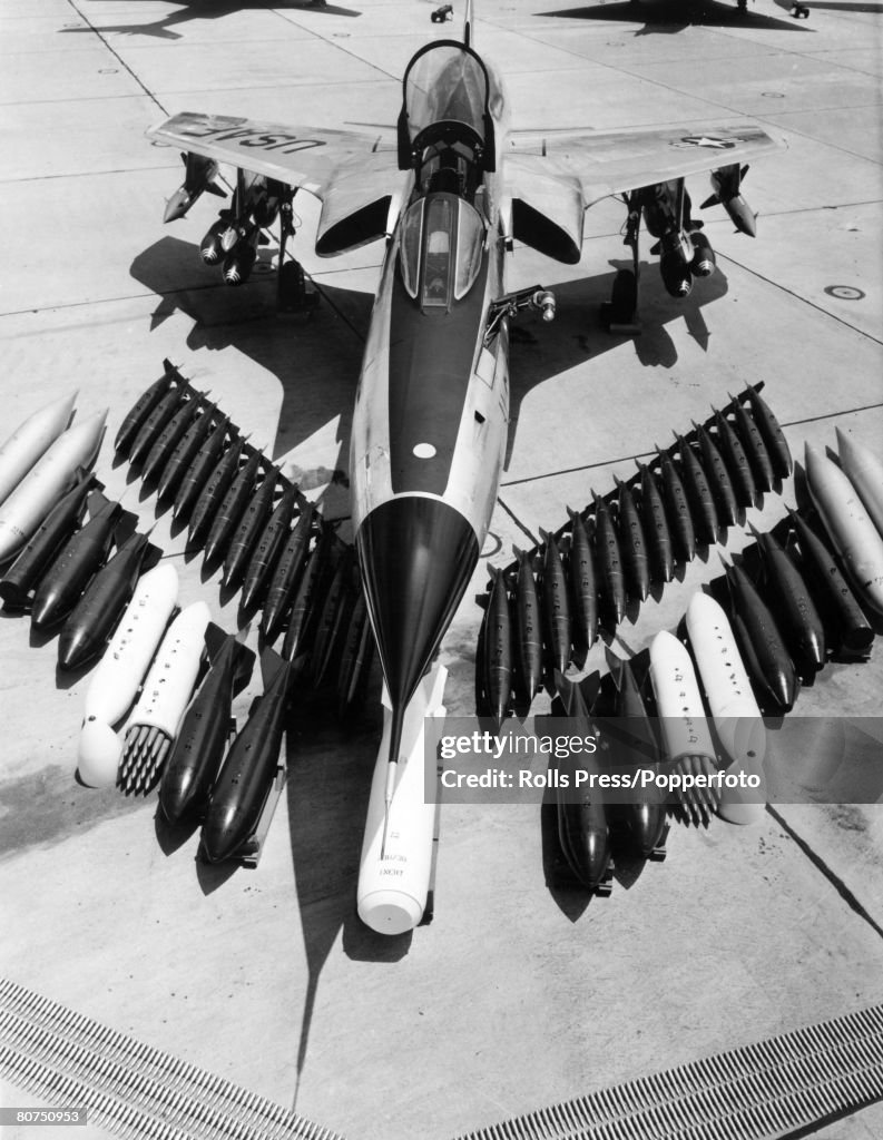 War and Conflict Aviation. Military. pic: 1962. Eglin Air Force Base, Florida. The Republic F-105D "Thunderchief" fighter bomber in service with the United States Air Force, showing the payloads it can deliver.