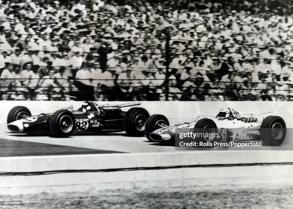 Sport Motor racing. Indianapolis, USA. 31st May 1965. 500 Mile Race. Grand Prix driver Jim Clark (82) driving a Lotus Ford gets ahead of pole position holder AJ Foyt to take the lead. Clark won the race.