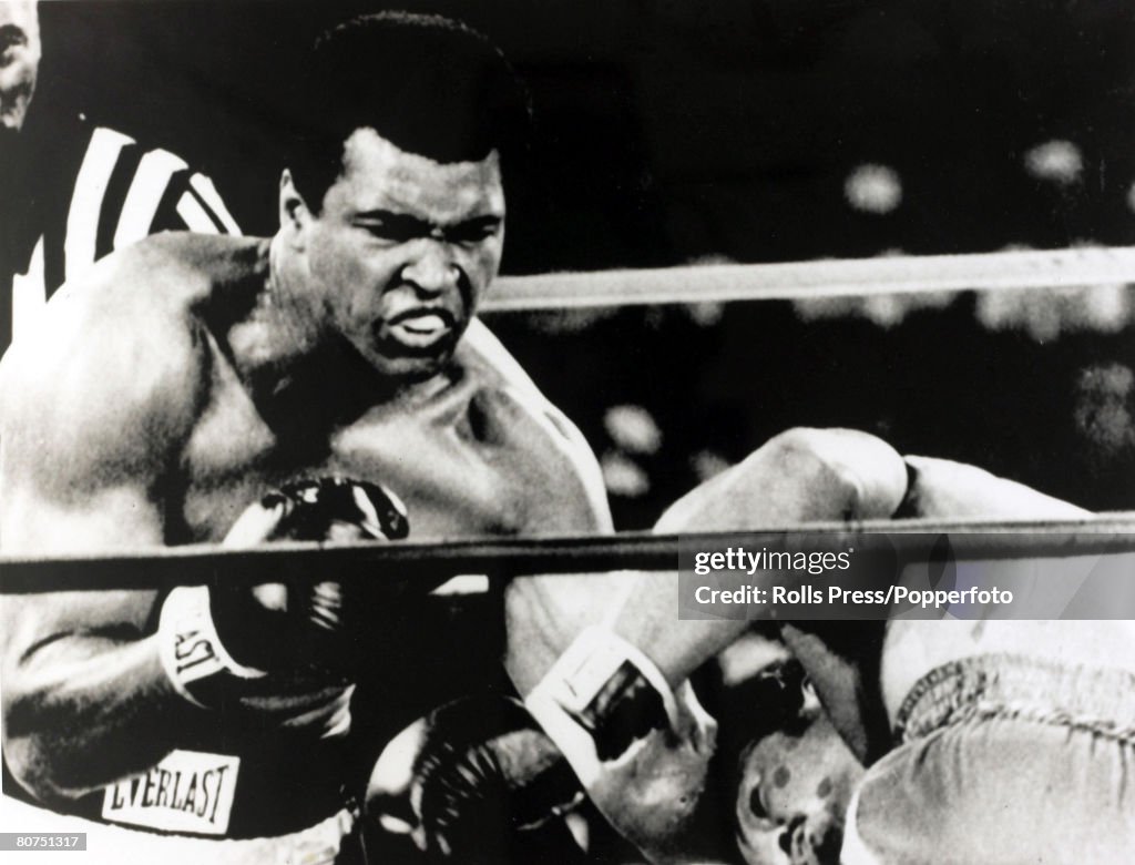 Sport Boxing. World Heavyweight Championship. Kinshasa, Zaire. 29th October 1974. Muhammad Ali on the attack with a left-right combination to send George Foreman to the canvas on his way to regaining the World Heavyweight title.